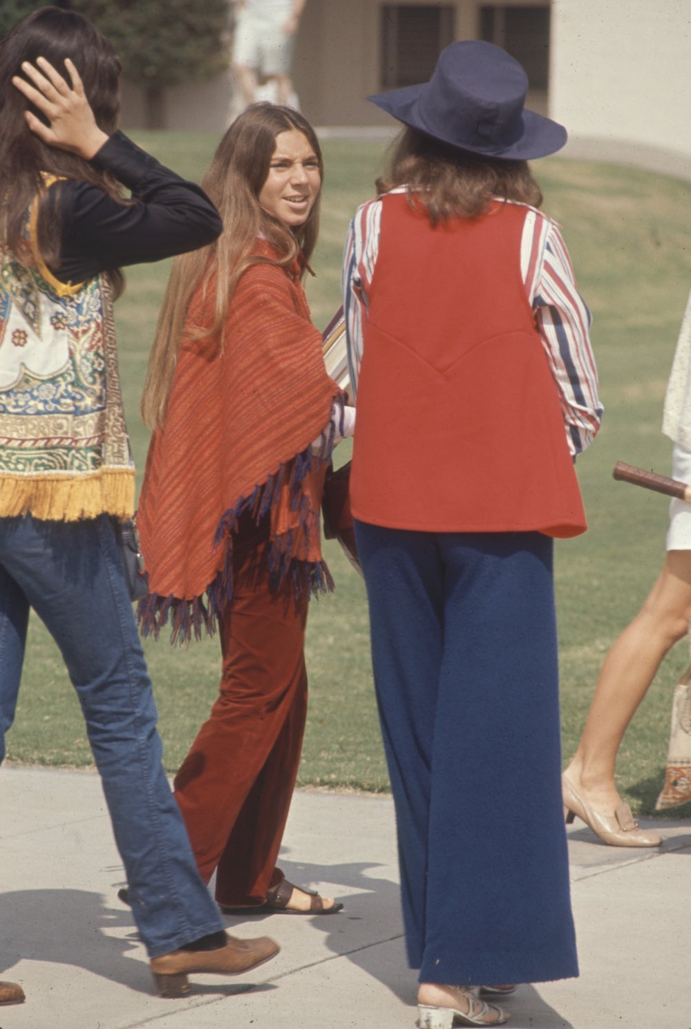 Subject: Students of Woodside High wearing hippy fashion like ponchos, boots, and sandals. California October 1969 photographer- Arthur Schatz Time Inc Owned Merlin- 1201958